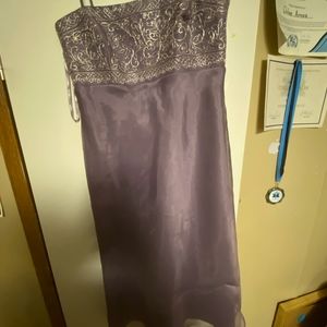 Michelangelo dress, size 8 lavender in color worn once.
